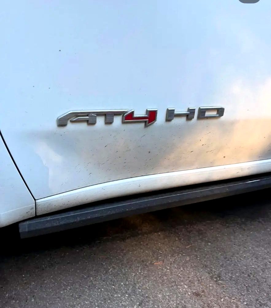 Before: Road-trip grime off the paint, GMC Sierra AT4 HD